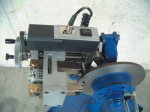 Máy tiện láng đĩa phanh trên xe TD 302